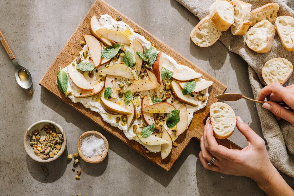 Ricotta With Pears and Pistachios Is the Simple Snack We’re Craving