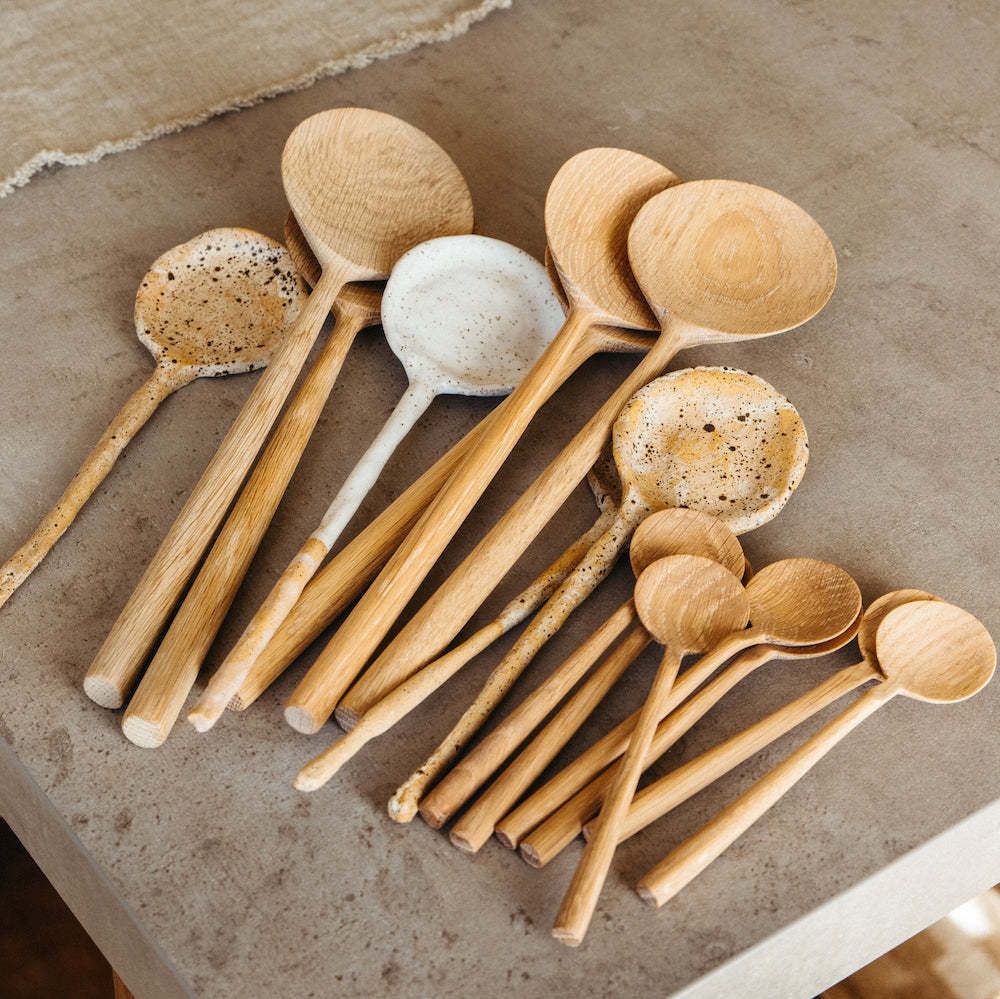 small wooden spoons arranged on countertop