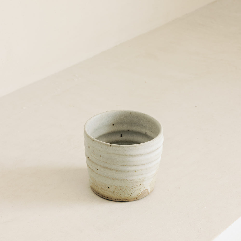 large ceramic mug with no handle