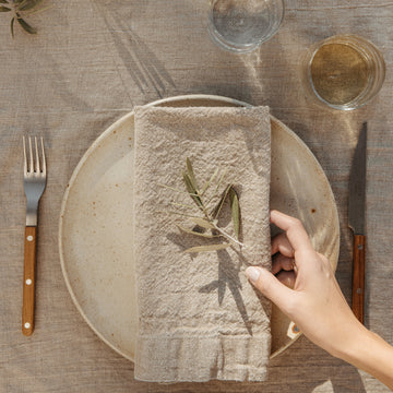 large oversized linen napkins with stoneware dinner plate recycled glass and Sabre flatware